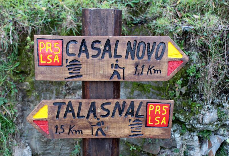 Signs for the hiking routes to nearby villages of Casal Nova and Talasnal, Lousã